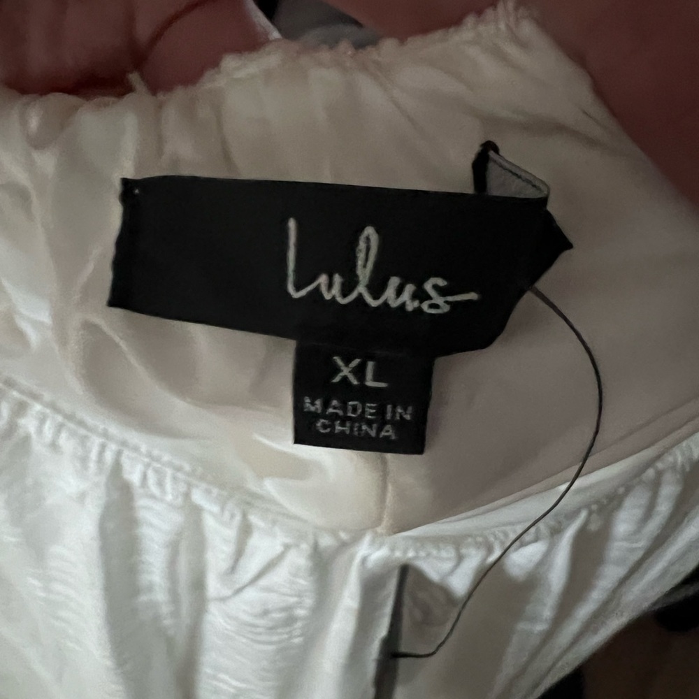 Lulu’s white flowy dress